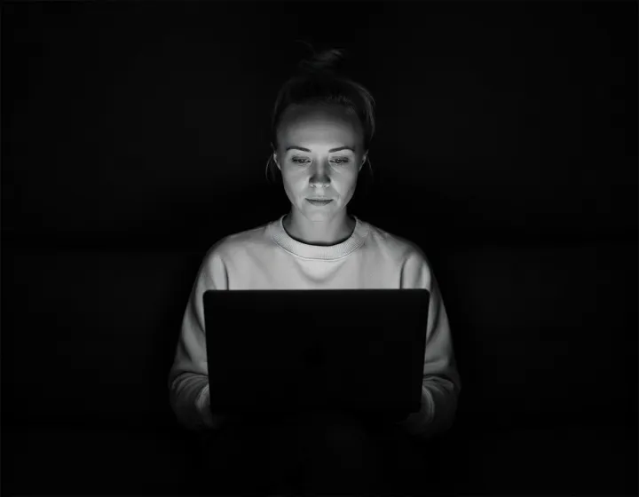 Katie Rutten, who runs every Bullfinch project, working on a laptop