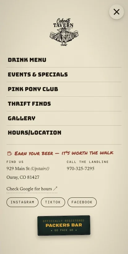 Cahoots Tavern site navigation open on a phone: drink menu, events, hours and location, the address and landline