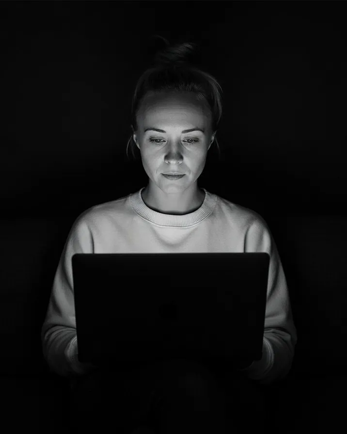 Katie Rutten, who runs each Bullfinch project, its schedule and the client account, at her laptop