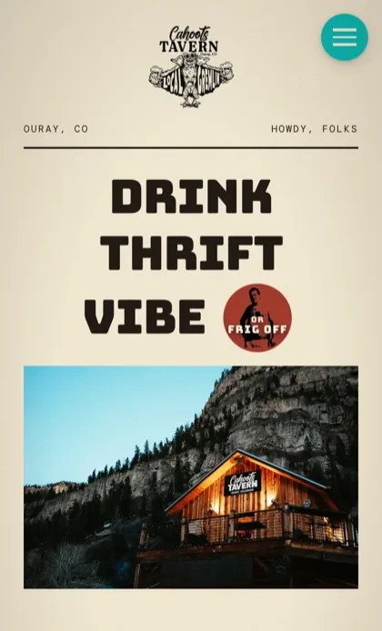 The Cahoots Tavern homepage on a phone: the logo, a three-word headline on cream, and the wooden tavern below a cliff.