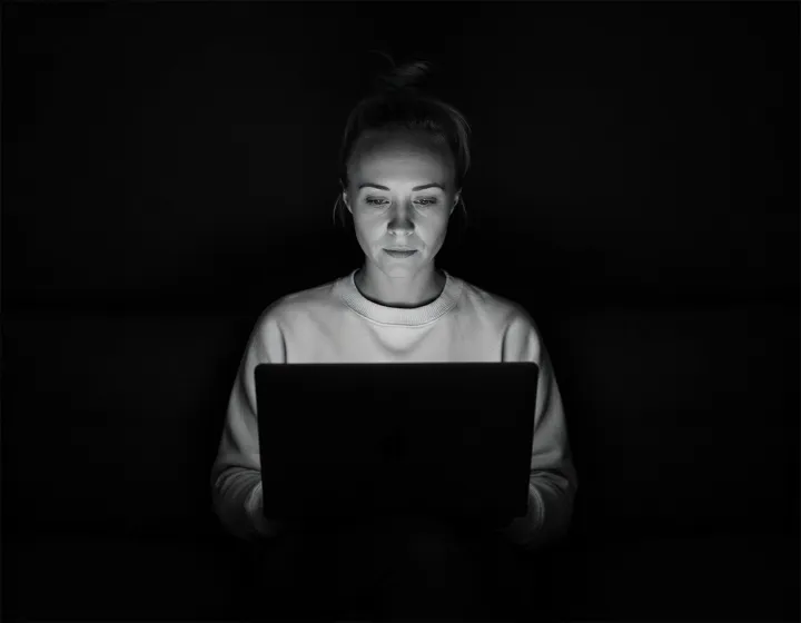 Katie Rutten, who runs the project, the schedule and the account, at her laptop