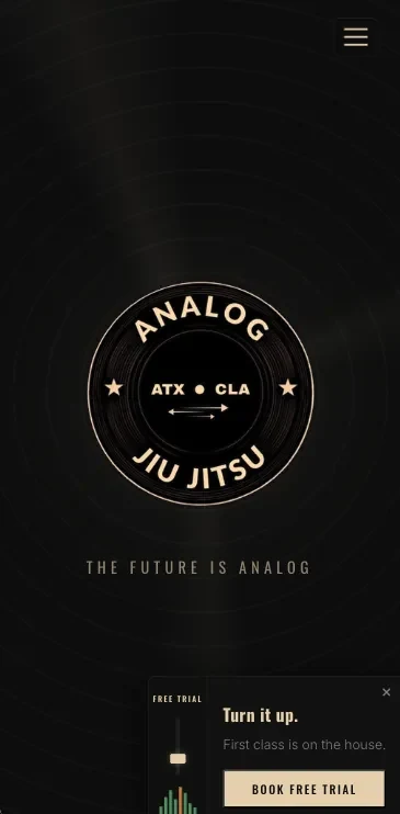 Analog Jiu Jitsu homepage on a phone, with the Book Free Trial button in view