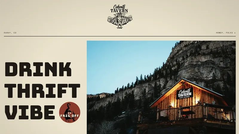The Cahoots Tavern homepage: a cream page reading "Drink thrift vibe" beside the lit tavern below a rock cliff.